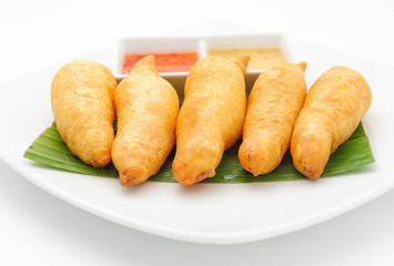 Tiger prawns fried in dough isolated on white.