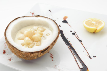 Scallop boiled in coconut milk isolated on white.