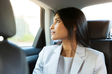 indian businesswoman in a car