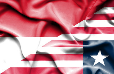 Waving flag of Liberia and Monaco