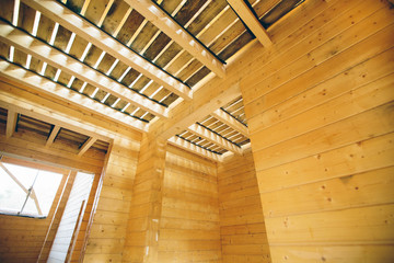 Obraz premium The inside of an unfinished wooden house that is under construct