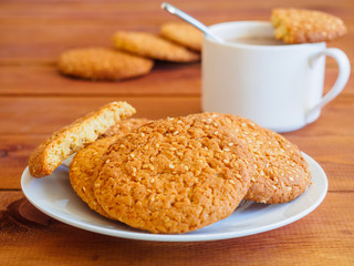 Oatmeal cookies on wooden background