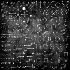 Set of Simple Hand Drawn Arrows on Chalkboard Graphic Design.