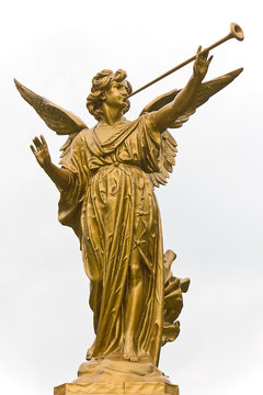 Statue Of Angel And Trumpet.