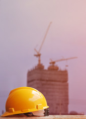 Safety helmet with construction site background