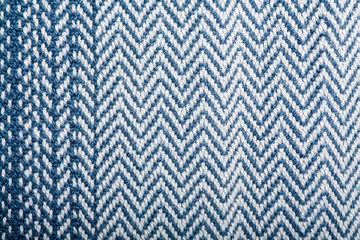 Handmade fabric with blue striped texture. Clothes background