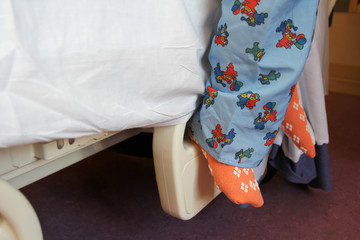 Child's Feet on Hospital Bed