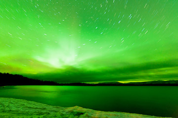 Fototapeta na wymiar Aurora borealis sky frozen Lake Laberge Yukon