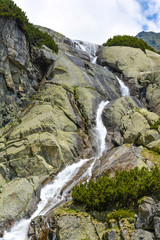 Skok waterfall, High Tatras in Slovakia © huspi