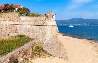 Fototapeta na wymiar Old stone fortress on the sea cost. Corsica, France