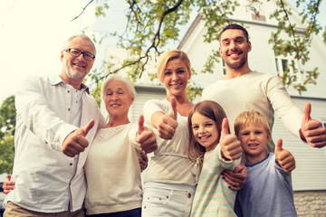 happy family in front of house outdoors