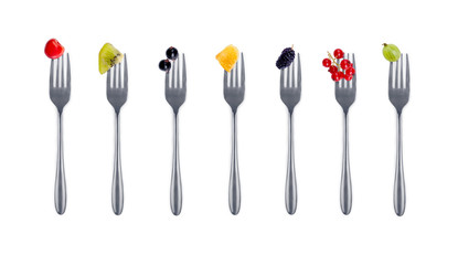 berries on forks isolated on white background