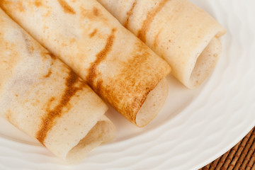Set of traditional south Indian Dosa (Dosai) on a plate.
