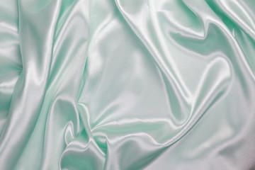 Light green Silk cloth of wavy abstract background