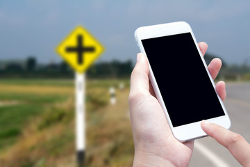 woman hand hold and touch screen smart phone