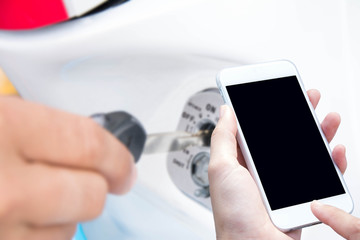 woman hand hold and touch screen smart phone