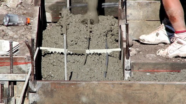 Pouring Cement into Foundation