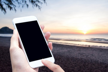 woman hand hold and touch screen smart phone