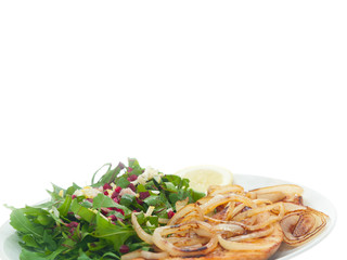 fried turkey fillet with mixed greens and lemon