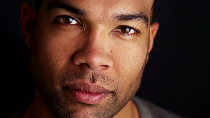 African man smiling at camera - Powered by Adobe