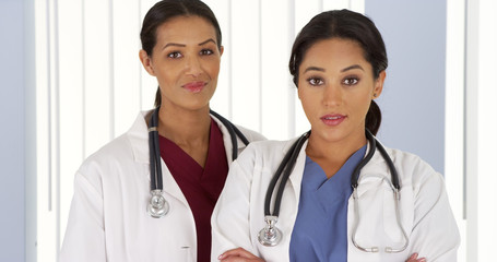 Fototapeta premium Portrait of two female Medical professionals in hospital