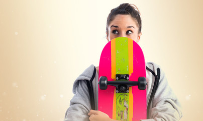 Young woman with skate