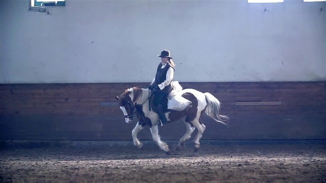 Slow Motion Cowgirl Galloping Horse
