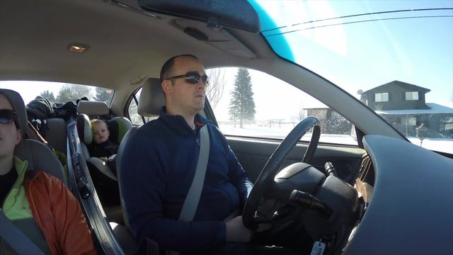 An interior shot of car driving in utah mountains
