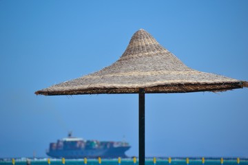 Sonnenschirm im Sand