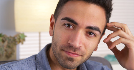 Attractive Mexican man looking at camera