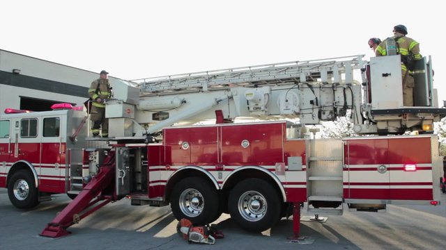 fire truck with firefighters