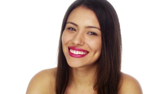 Sweet Mexican woman smiling at camera
