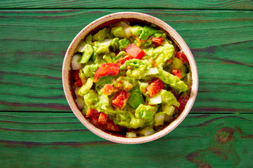 Guacamole with avocado and tomatoes mexican
