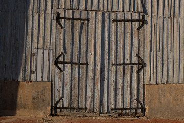 Old barn wooden gates closeup