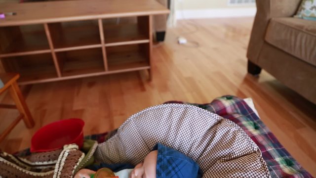 jib shot toddler with a flu lying on the floor