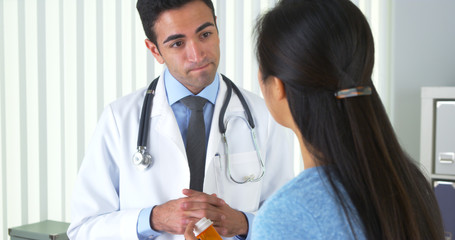 Mexican doctor explaining new prescription to patient
