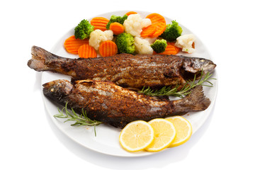 Fish dish - fried trout with vegetables 