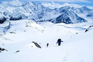 Fototapeta na wymiar Hiking in winter mountains