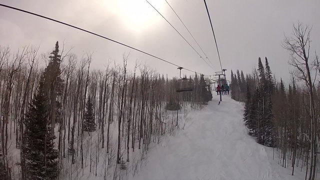 riding chairlift in snow storm