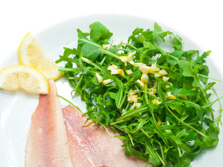 smoked trout fillets with arugula and lemon