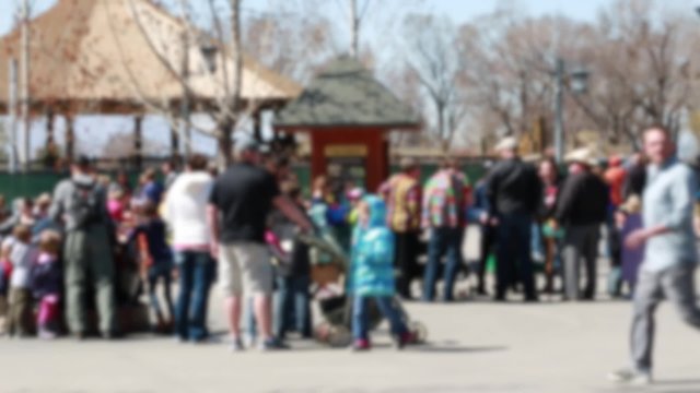 families at the zoo out of focus