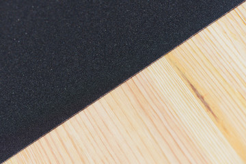 Workplace and tools of a carpenter or builder-background sandpaper and wood surface