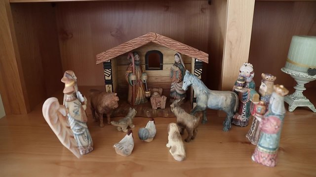 A hand carved wood Nativity creche