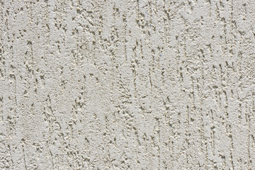 Plasterer concrete on wall of house construction