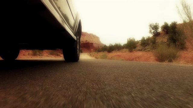 low shot of car in desert