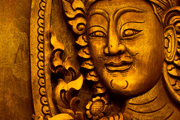 Fototapeta na wymiar Wood carvings, gold in temple ,Thailand