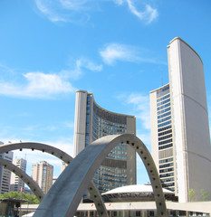 View of Toronto City Hall with blue sky as background