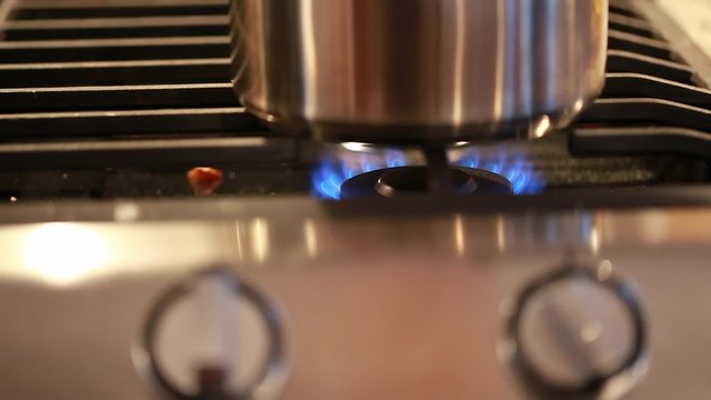 flame on a gas stove in the kitchen