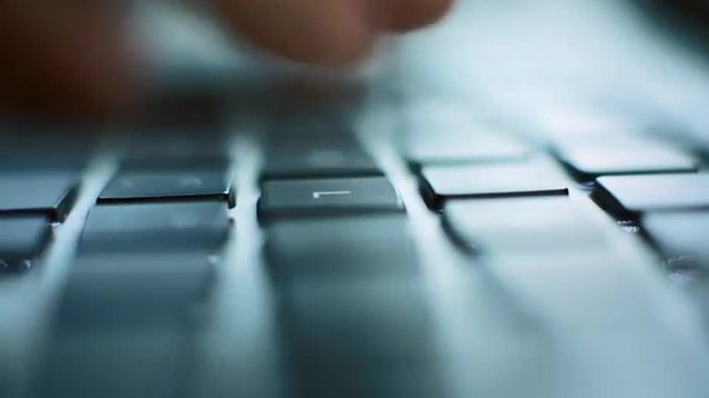 MACRO shot of a person typing on his keyboard. Canon 5D mark 3, Magic Lantern RAW, Canon 50mm f1.4