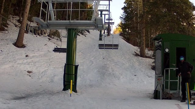 riding the ski lift